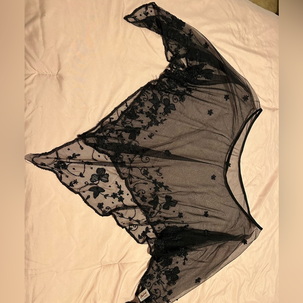 One size fits all. Black beaded top body cover